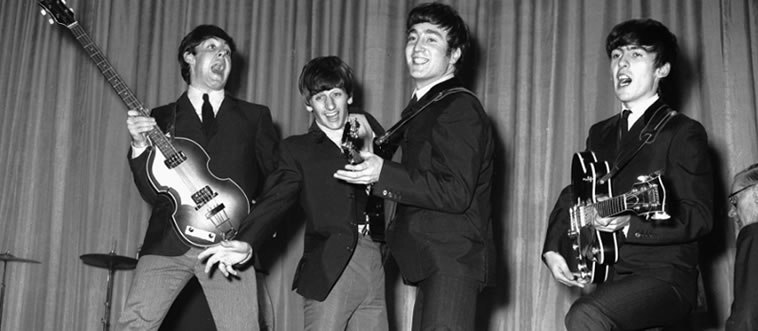 Which Liverpool group, born in 1960, is usually blamed for igniting the whole British Invasion?