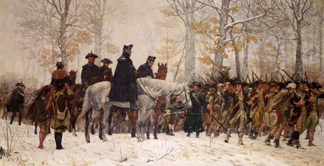 During a particularly nasty winter, in what location did Washington transform his messy band of underdogs into a polished fighting force?