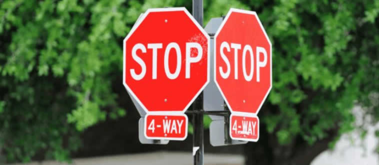 Imagine you've reached a four-way stop. Which lucky motorist gets to go first?